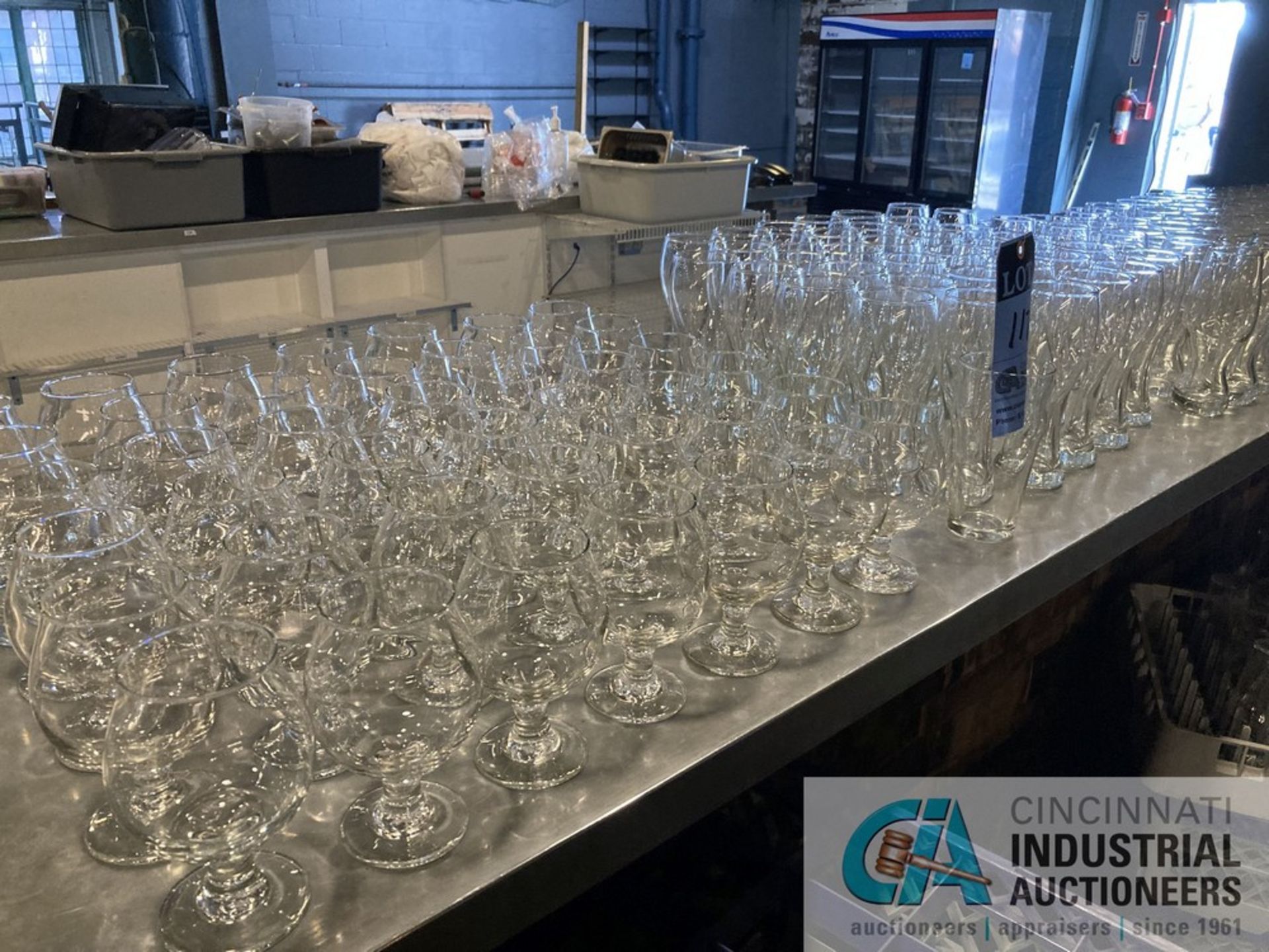 (LOT) ASSORTED GLASSWARE **For convenience, the loading fee of $200.00 will be added to the