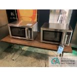 (LOT) (2) MICROWAVES AND TABLE **For convenience, the loading fee of $200.00 will be added to the