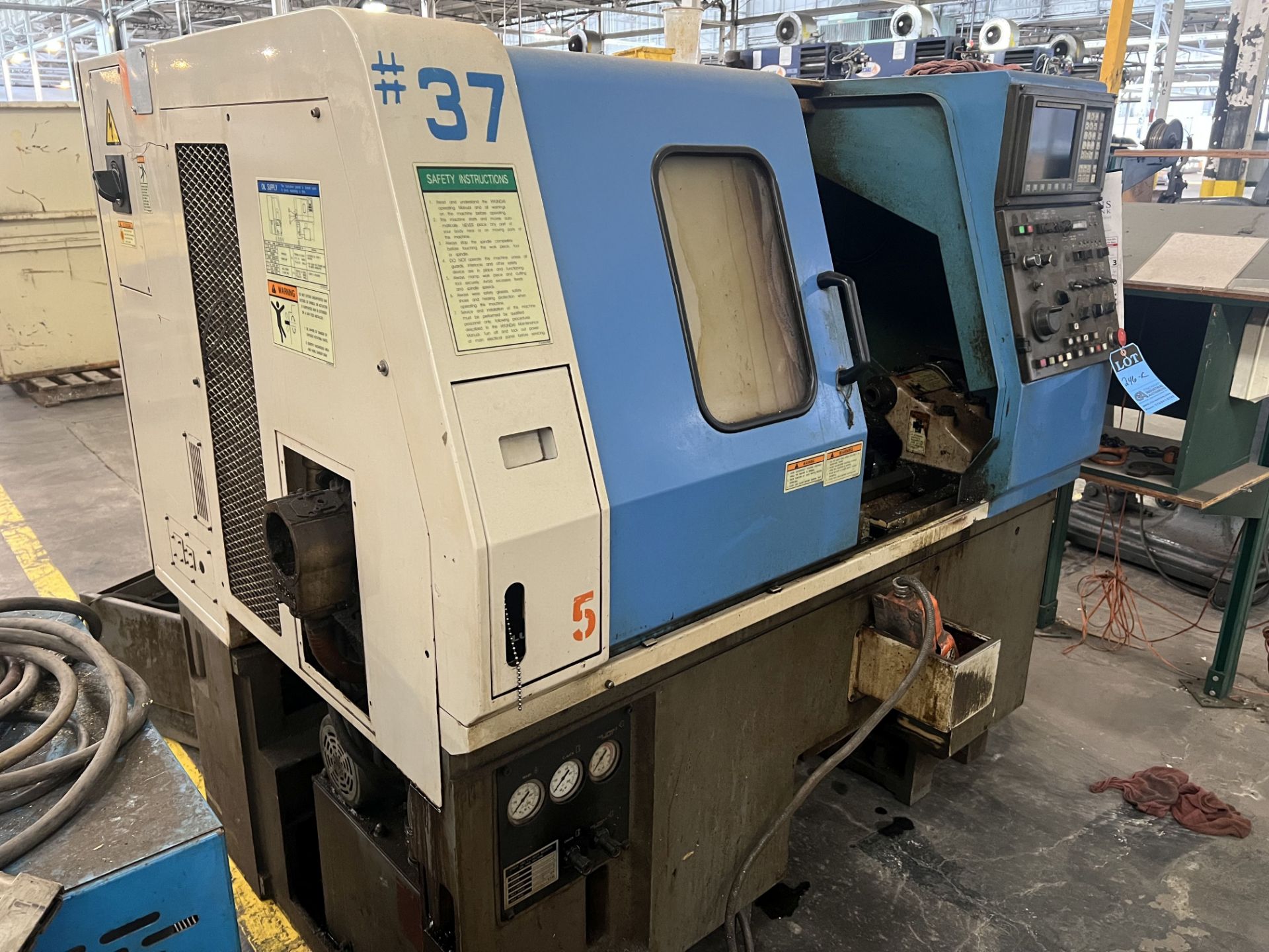 HYUNDAI MODEL HIT-8F CNC TURNING CENTER; S/N 14757002 **For convenience, the loading fee of $200.00 - Image 6 of 10