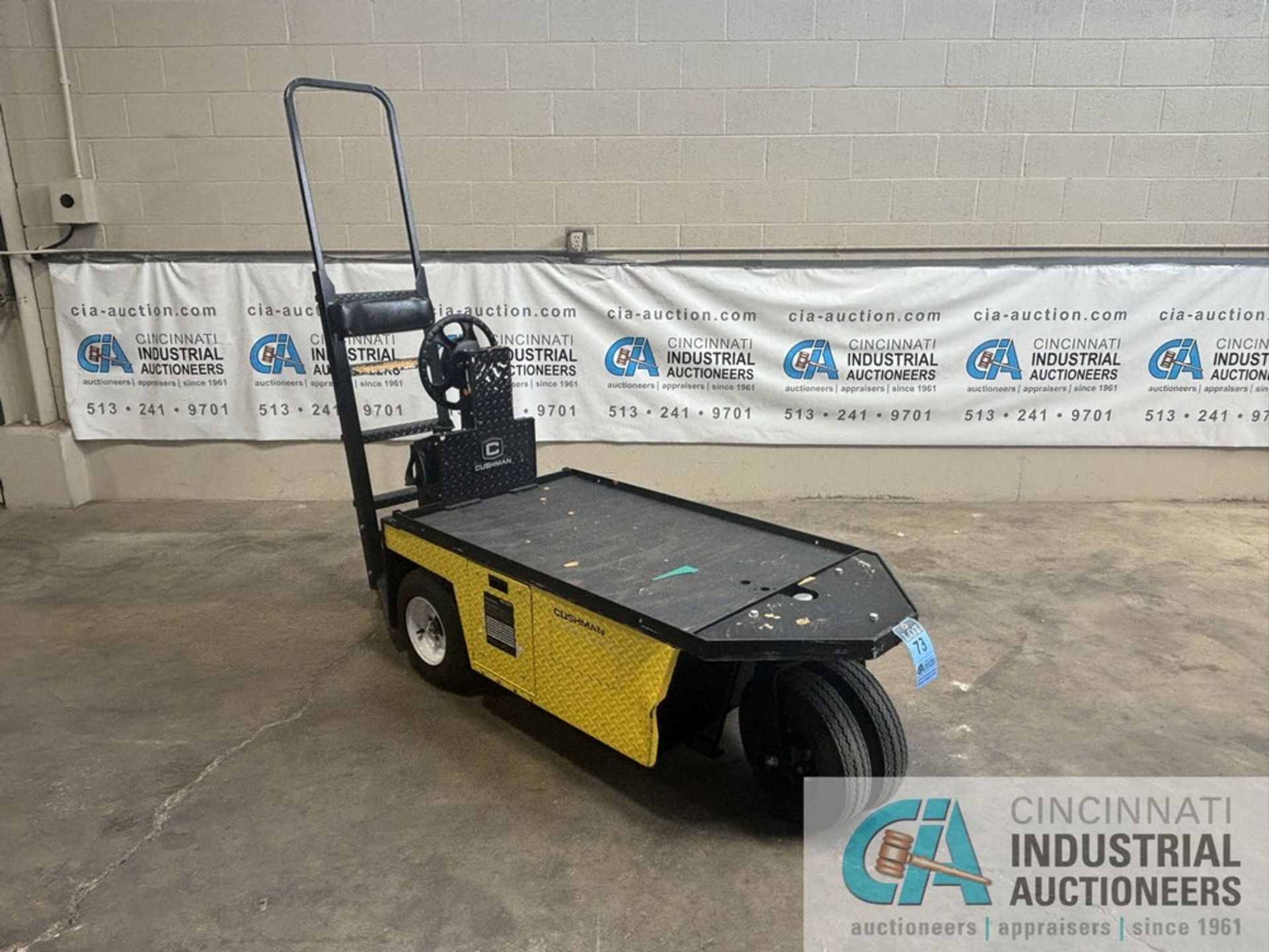 CUSHMAN STOCKCHASER ELECTRIC STAND-UP UTILITY CART; S/N 3058715, WITH BUILT IN 24-VOLT CHARGER