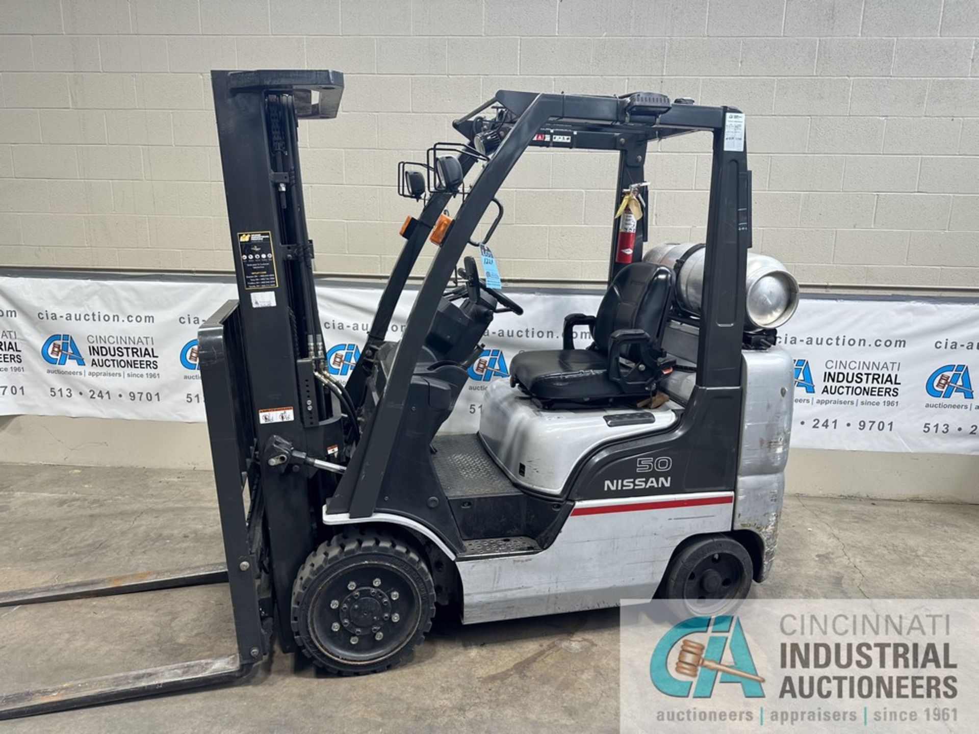 5,000 LB. NISSAN MODEL 50 LPG SOLID TIRE FORKLIFT; S/N CP1F2-9P2368, 187" LIFT HEIGHT, 83" MAST