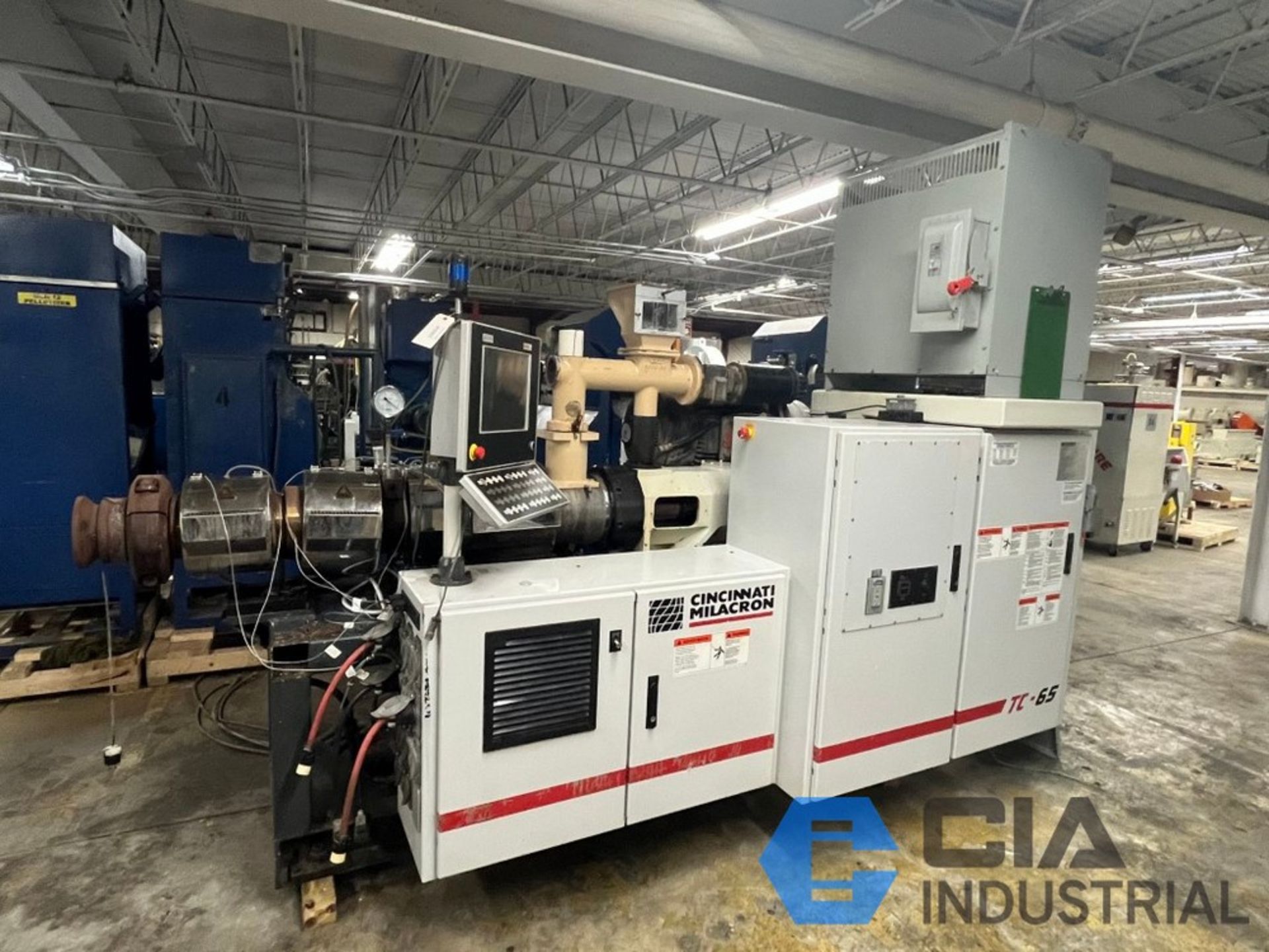 65mm Milacron Model TC65 Conical Twin Screw Extruder; s/n E65TCAC050010, 50 HP Allen Brandley AC