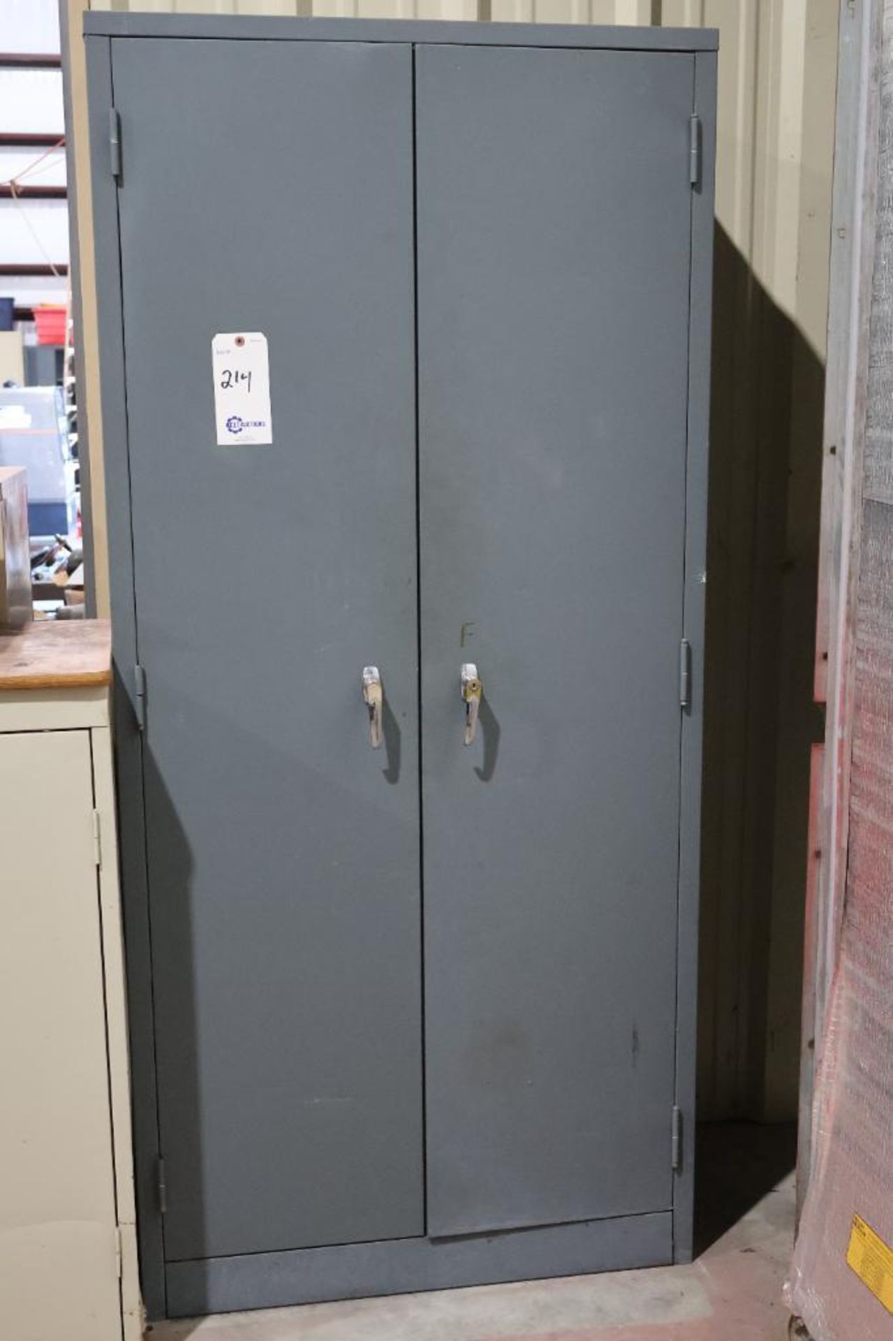 2 Door steel supply cabinet w/ contents