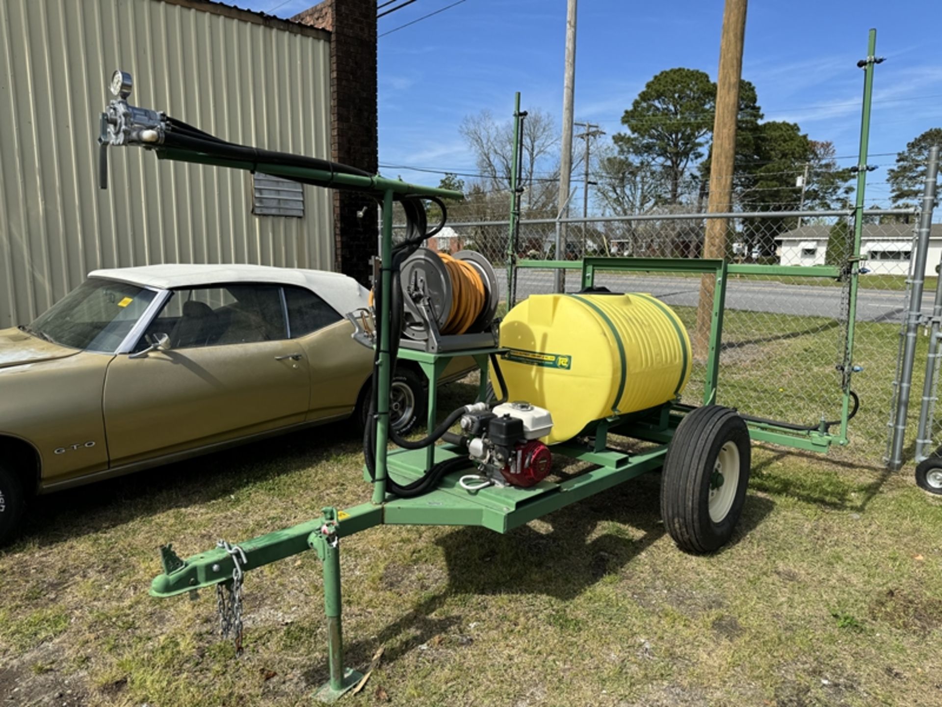 REDDICK 110 gallon pull tight sprayer, gas powered pump with booms and hose reel