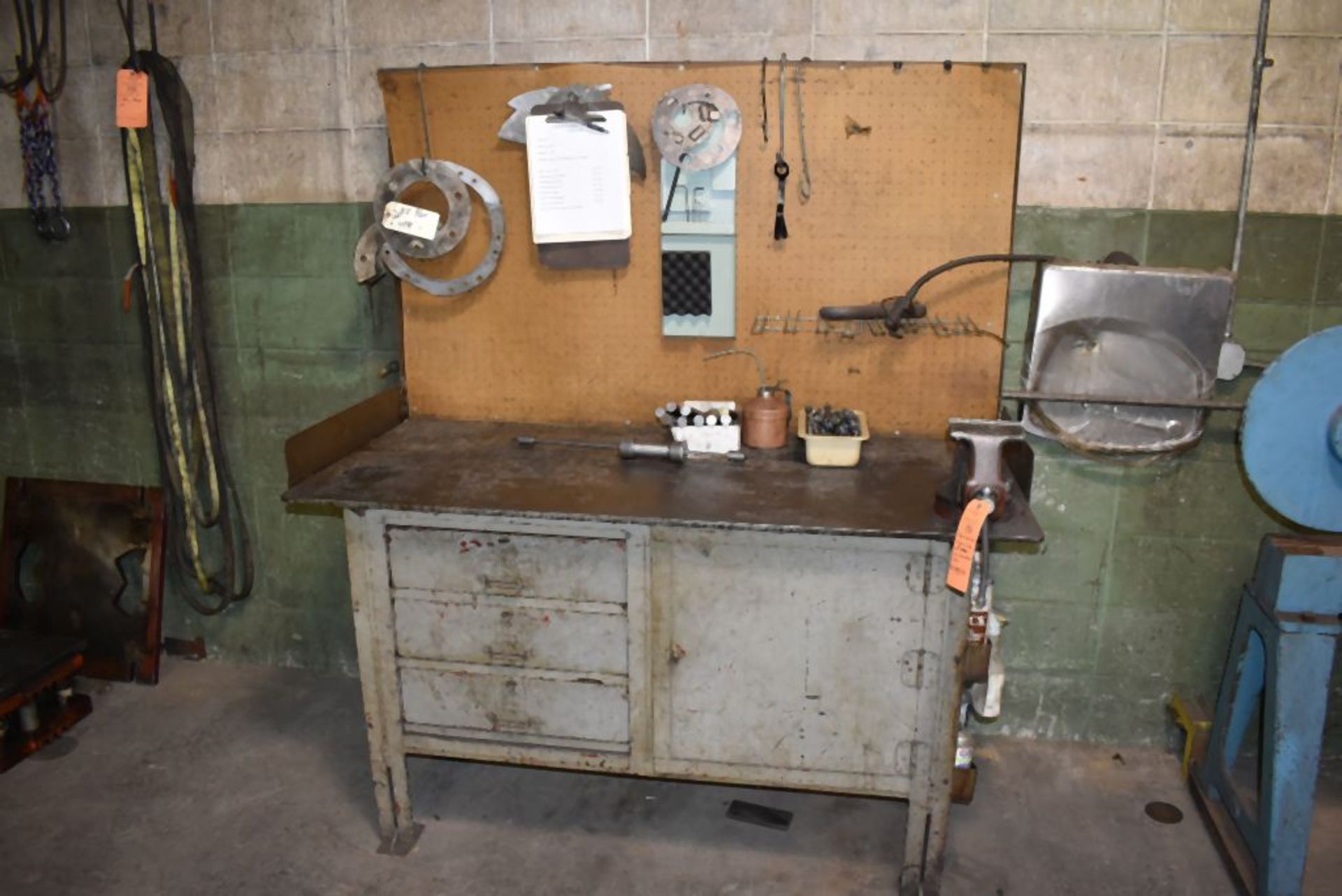 STEEL WORKBENCH WITH THREE DRAWERS AND ONE DOOR WITH 5" CRAFTSMAN SWIVEL VISE, INCLUDES CONTENTS,