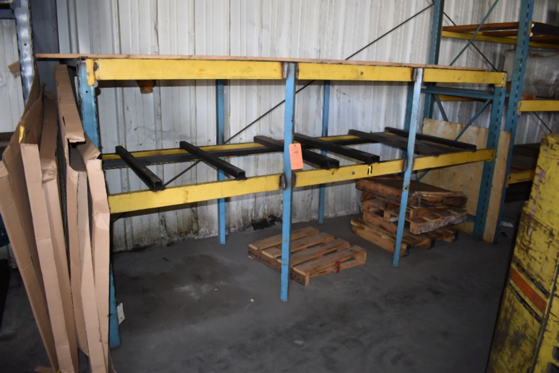 ONE SECTION OF TEAL/YELLOW PALLET RACKING WITH TWO METAL SHELVES, NO CONTENTS, 64"H x 138"W x 47"