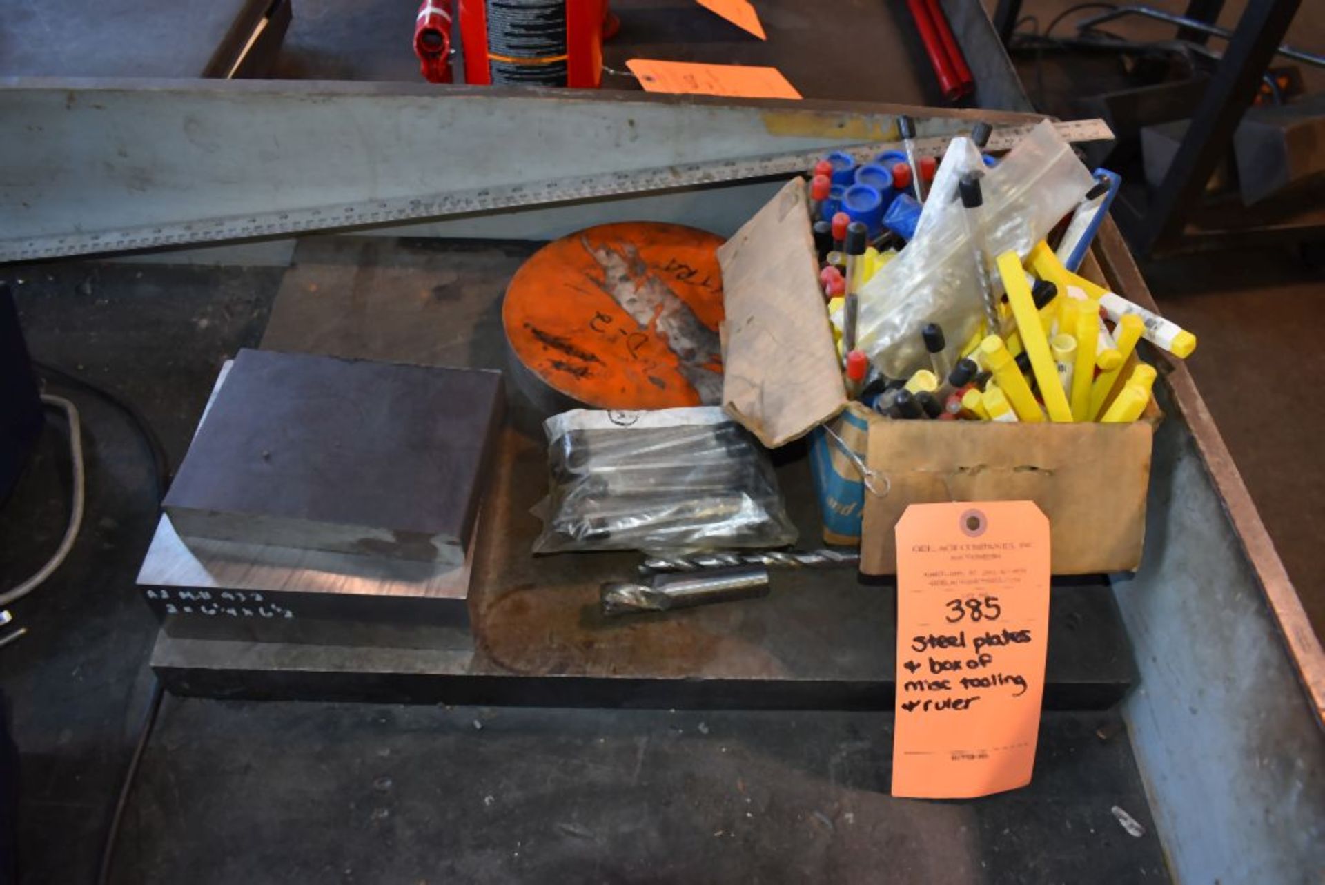 STEEL PLATES AND BOX OF MISC. TOOLING AND RULER