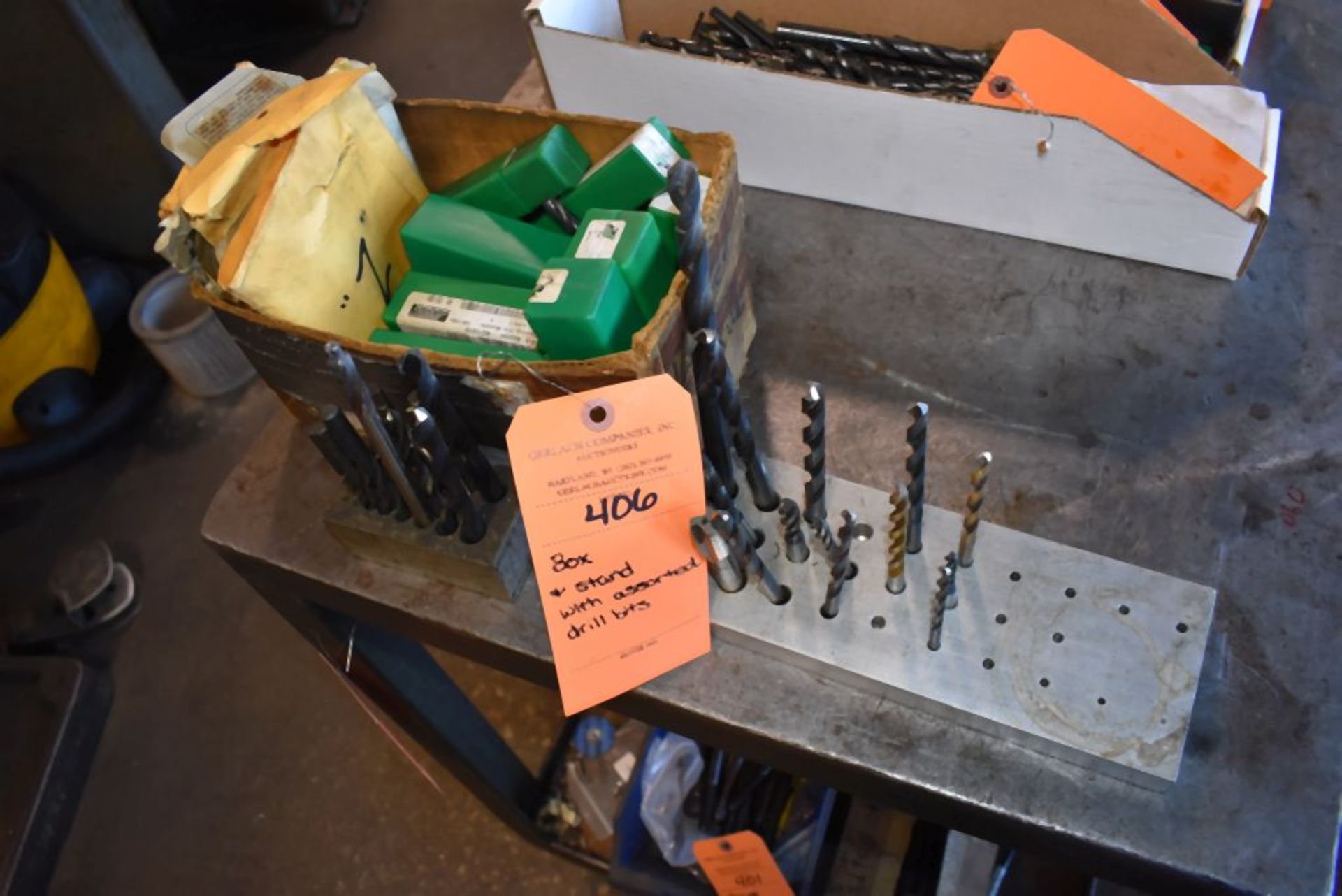 BOX AND STAND WITH ASSORTED DRILL BITS
