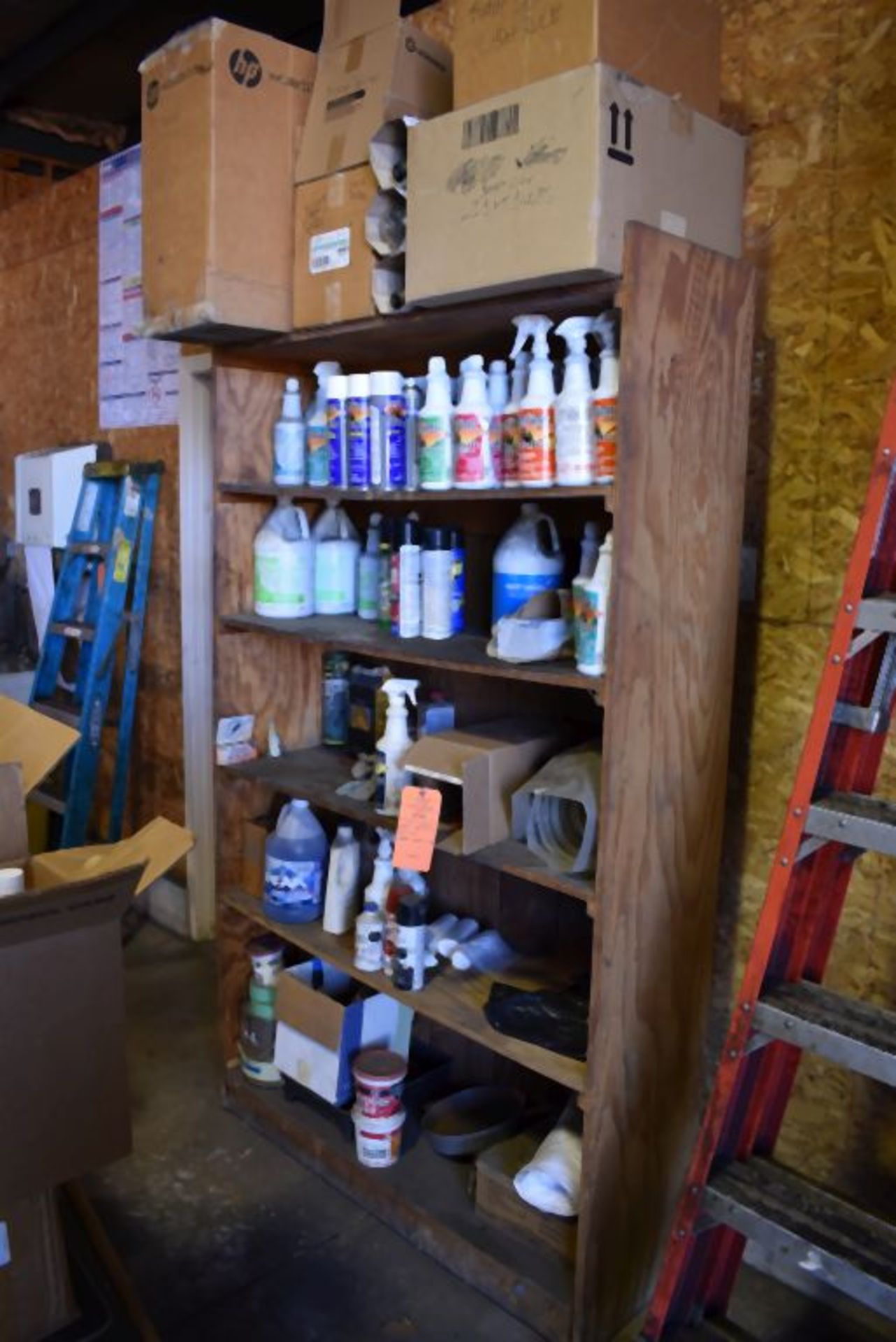 FIVE SHELF HOMEMADE WOODEN SHELVING UNIT WITH CONTENTS, PRIMARILY CLEANING SUPPLIES