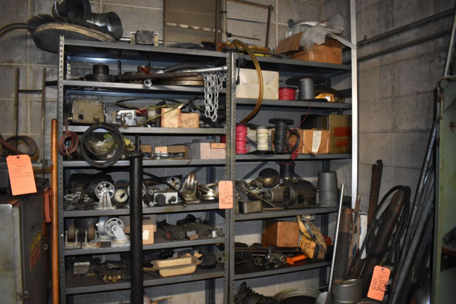 (2) SHELVING UNITS WITH CONTENTS - INCLUDES PIPE CUTTER, VISE, WIRE AND STEEL CASTERS