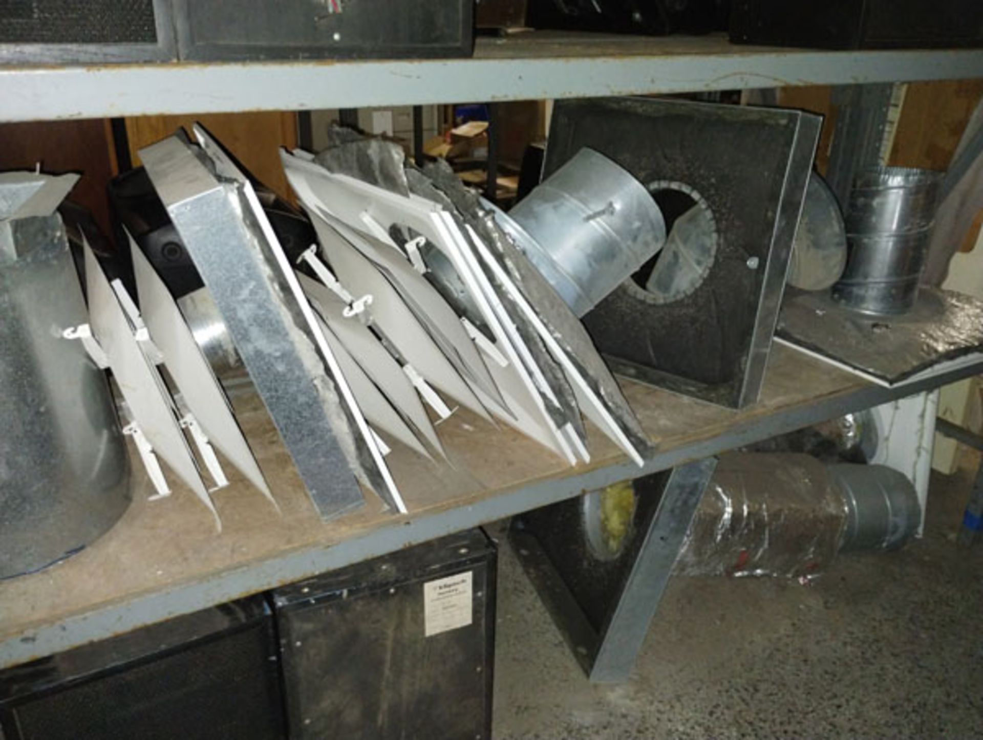 LOT OF ASSORTED DUCT WORK ON SHELF AND UNDER