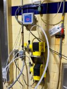 (2) LMI Metering Pumps with S/S Wall: Mounted on Stands - Rigging Fee: $100