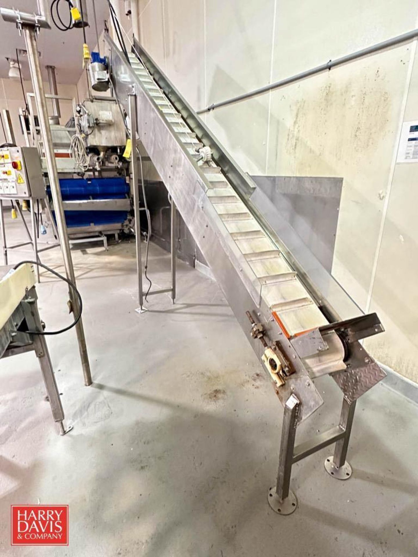 S/S Framed Elevator Conveyor: 12’ x 10.75" with Drive - Rigging Fee: $500