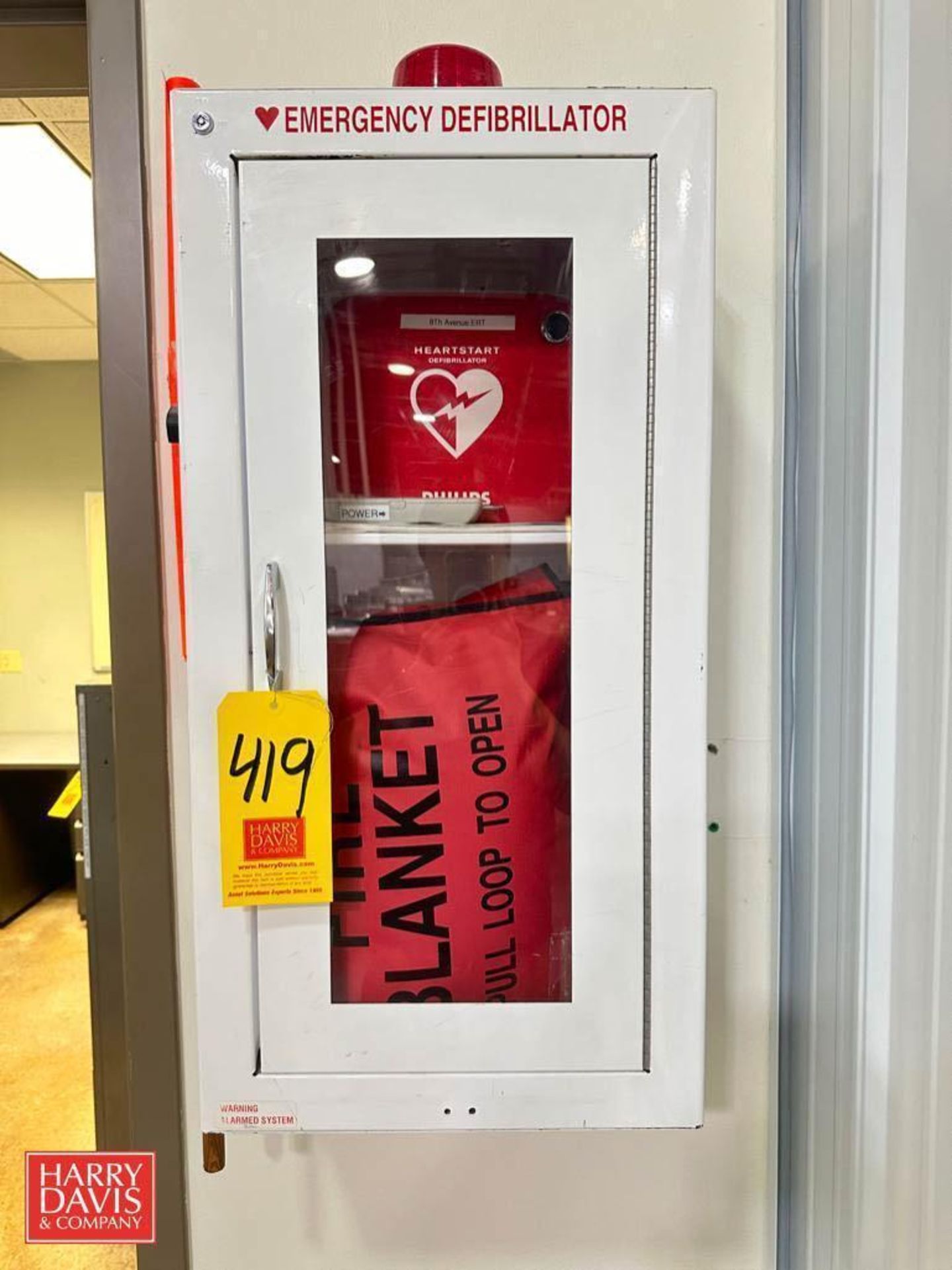 Philips Defibrillator and First Aid Cabinet - Rigging Fee: $25