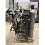 Miller XMT 450 CC/CV Welding Power Source on Casters with Miller 70 Wire Feeder