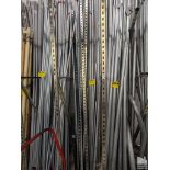 ASSORTED 10' CONDUIT ON WALL RACK