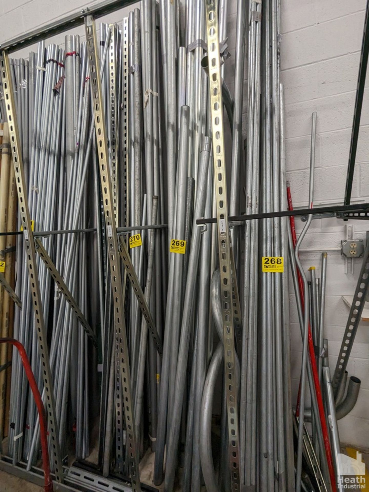 ASSORTED 10' CONDUIT ON WALL RACK