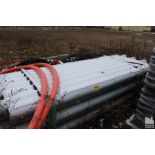 LARGE QTY OF PLASTIC PIPE IN (4) PILES
