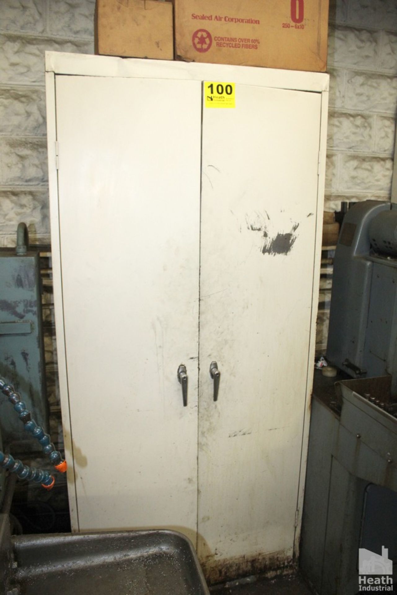 TWO DOOR CABINET WITH FIXTURES, PARTS AND SUPPLIES