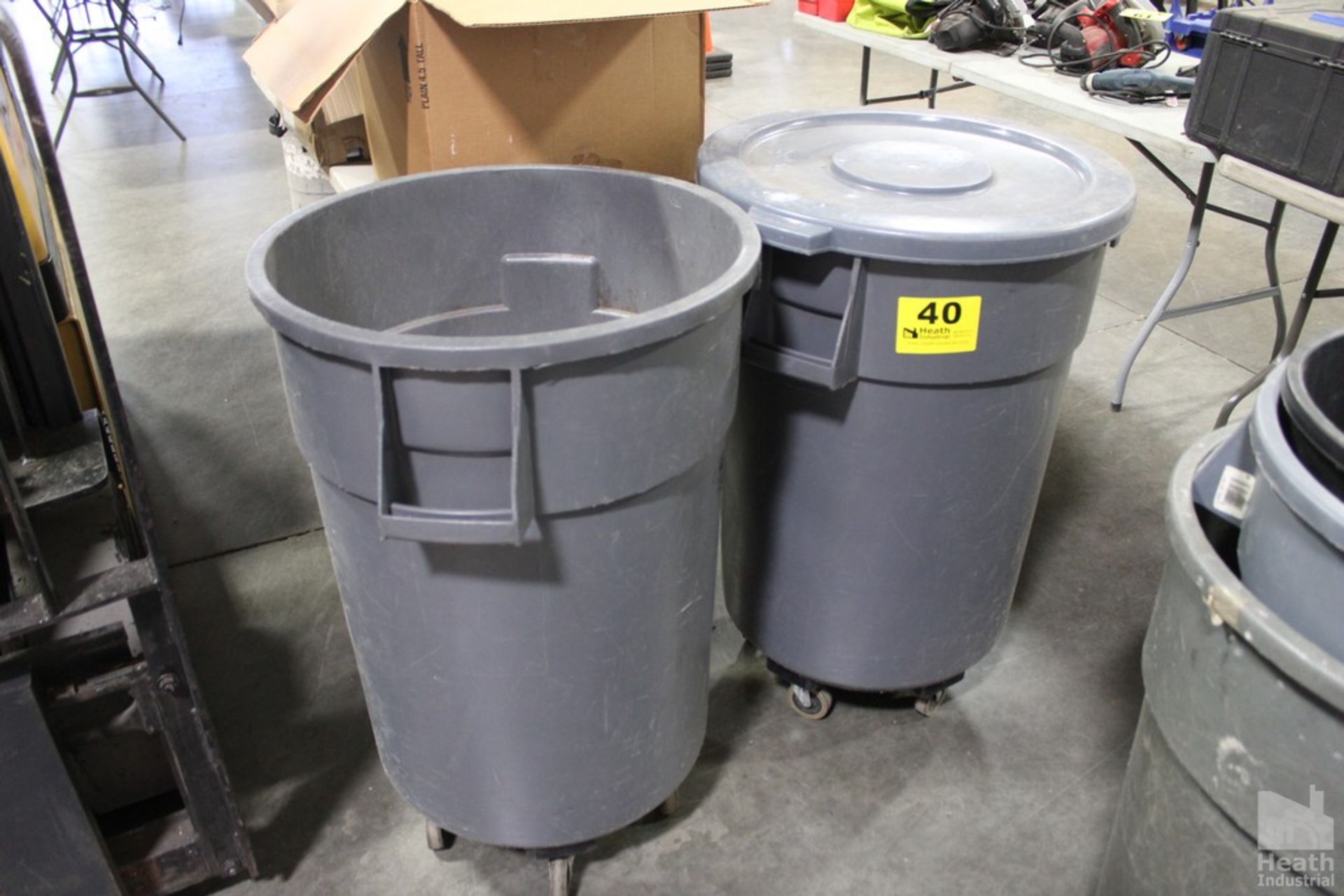 (2) BRUTE GARBAGE CANS WITH WHEEL CADDIES