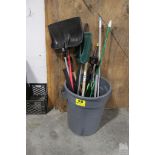ASSORTED SHOVELS AND BROOMS IN GARBAGE CAN