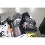 IRON GEAR BOXING GLOVES, APPEAR TO HAVE AN AUTOGRAPH ON THEM