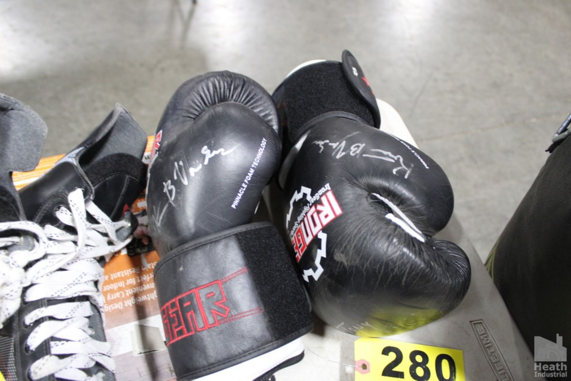 IRON GEAR BOXING GLOVES, APPEAR TO HAVE AN AUTOGRAPH ON THEM