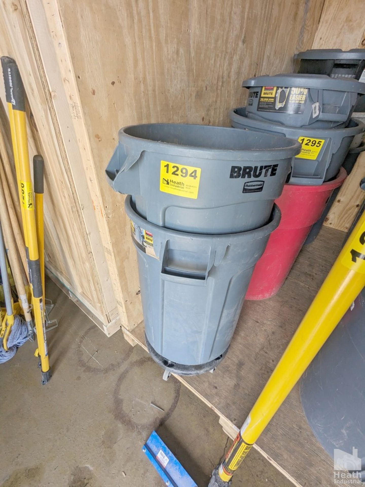 (2) RUBBERMAID "BRUTE" GARBAGE CANS AND WHEEL BASE