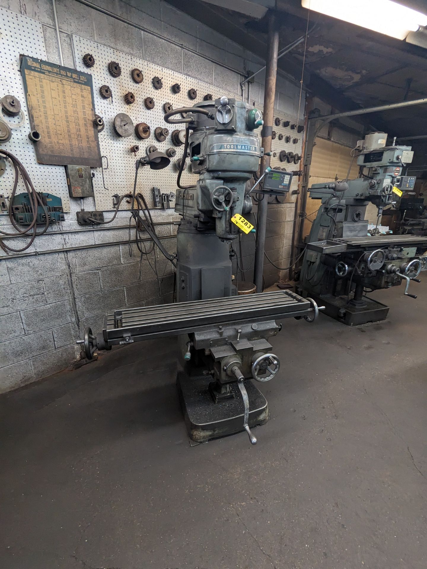 Cincinnati Model Toolmaster Ram Type Vertical Mill, s/n 6J4V5M-104, 48" Table, Newall Topaz DRO