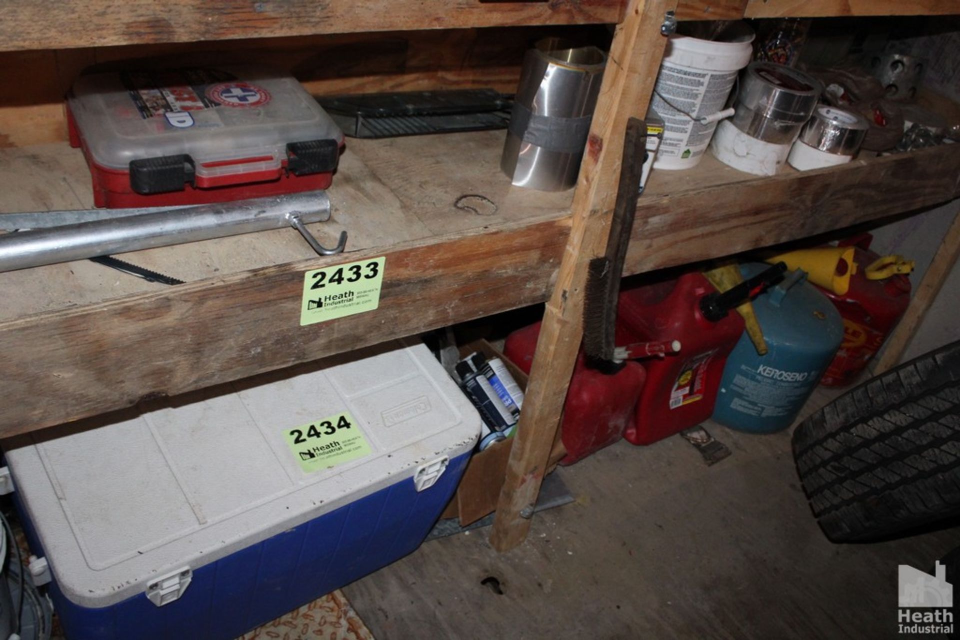 COOLER, HARDWARE AND GAS CANS ON SHELF