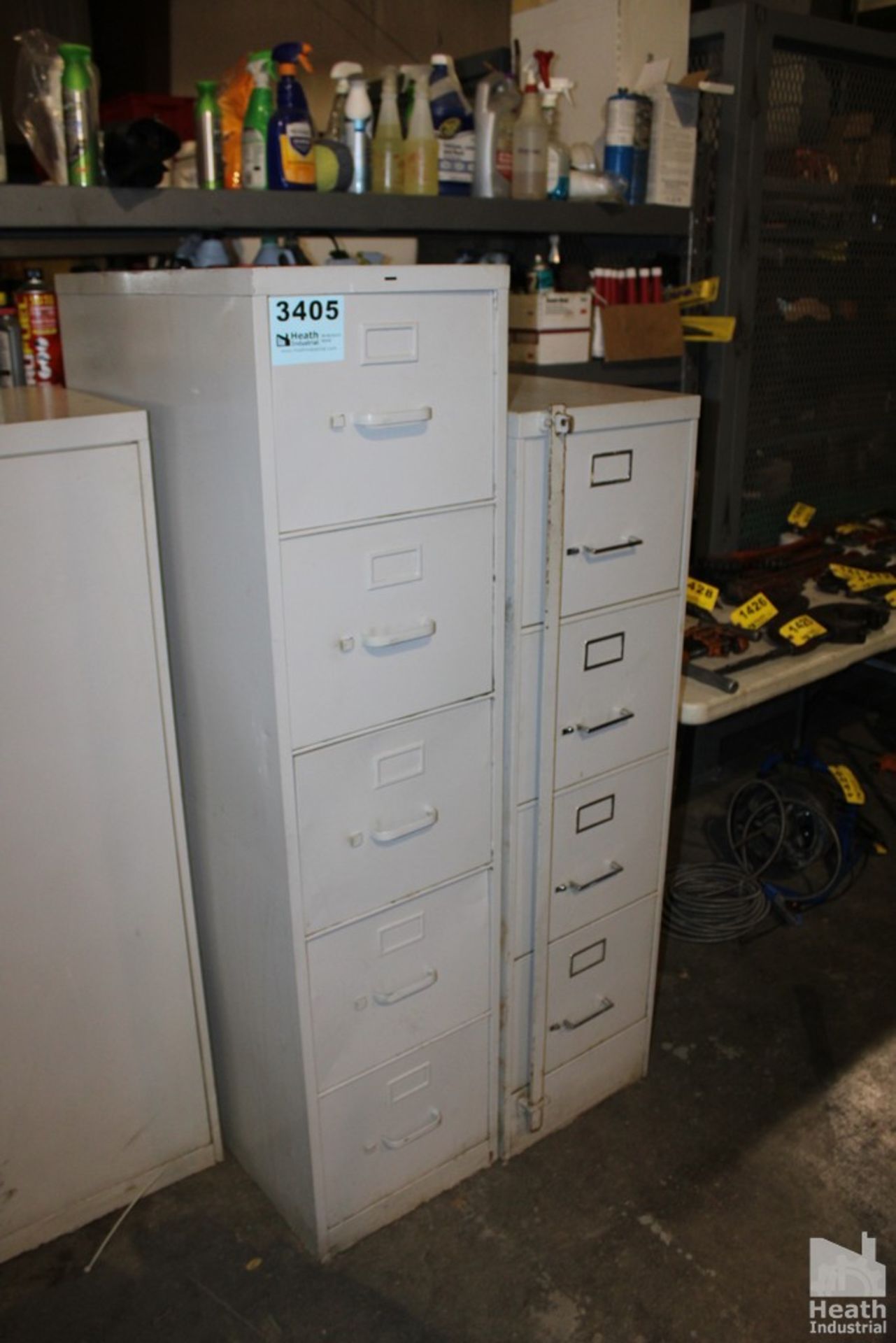 (2) FILE CABINETS (ONE HAS FOUR DRAWERS ONE HAS FIVE DRAWERS)