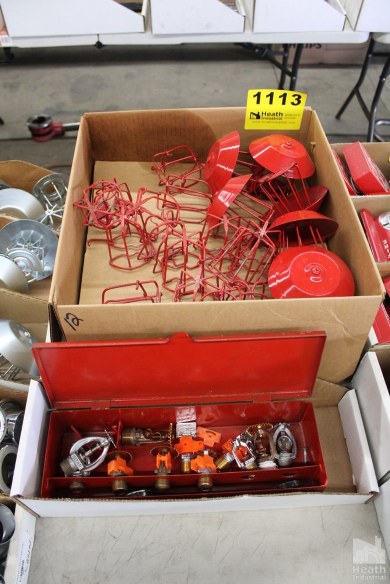LARGE QUANTITY OF SPRINKLER CAGES AND HEADS