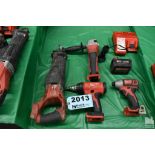 ASSORTED MILWAUKEE TOOLS ON TABLE, WITH CHARGER AND BATTERY
