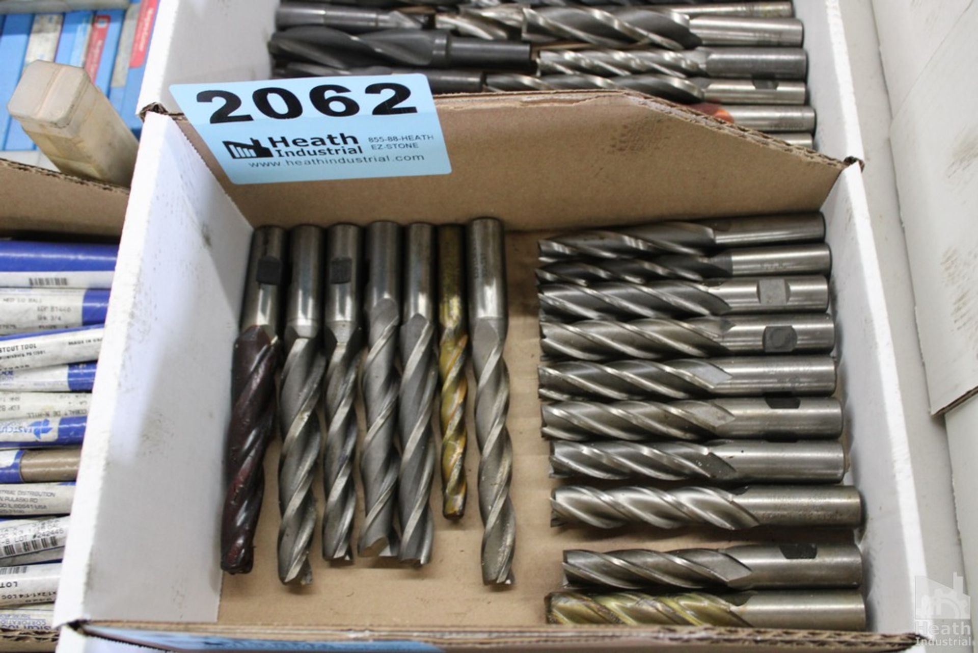 LARGE QUANTITY OF SINGLE END MILLS IN BOX