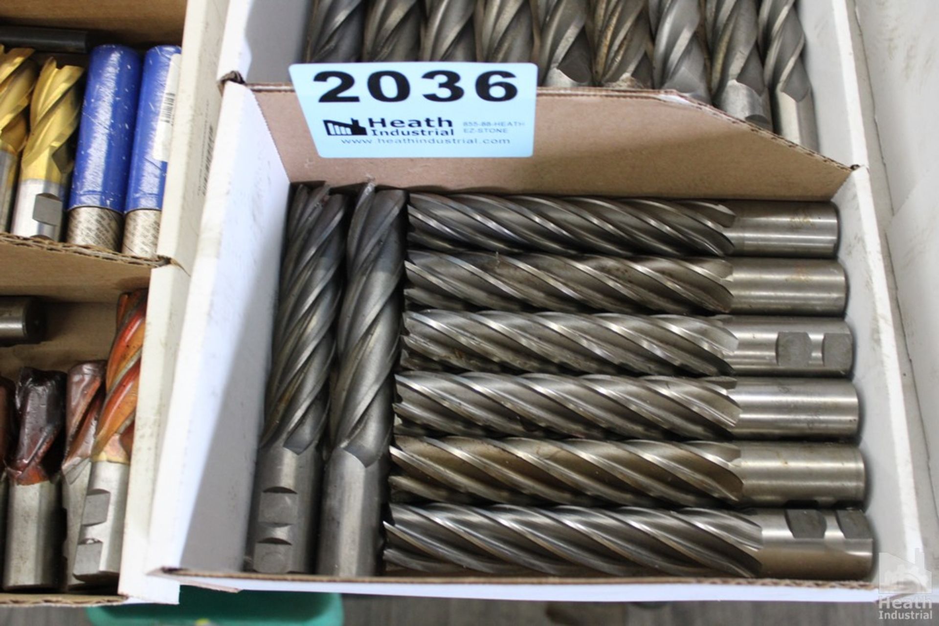 LARGE QUANTITY OF SINGLE END MILLS IN BOX