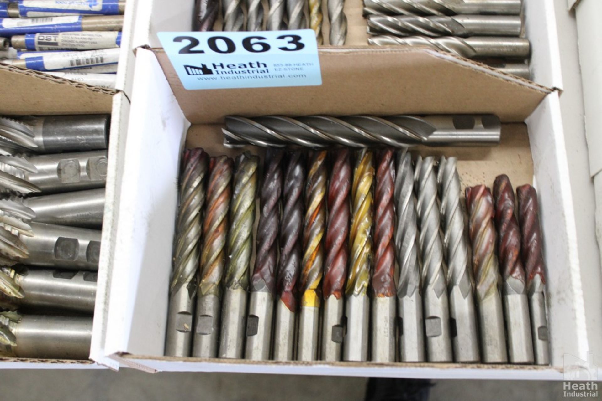 LARGE QUANTITY OF SINGLE END MILLS IN BOX