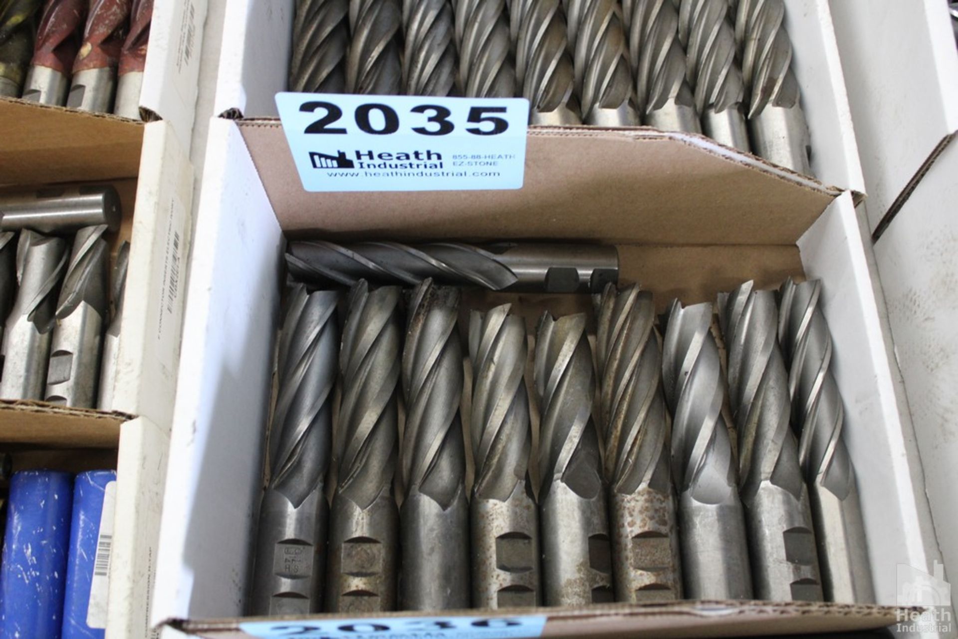 LARGE QUANTITY OF SINGLE END MILLS IN BOX