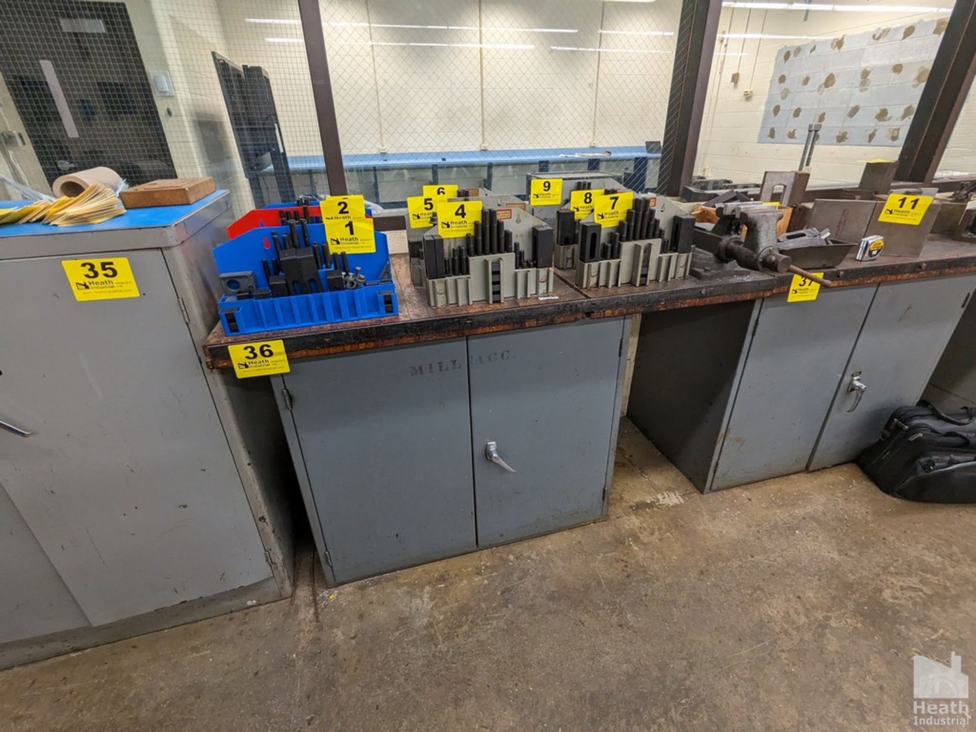 CABINET BASED WORKBENCH WITH 4" BULLET- STYLE VISE 52" X 24" X 33" Loading Fee :$125