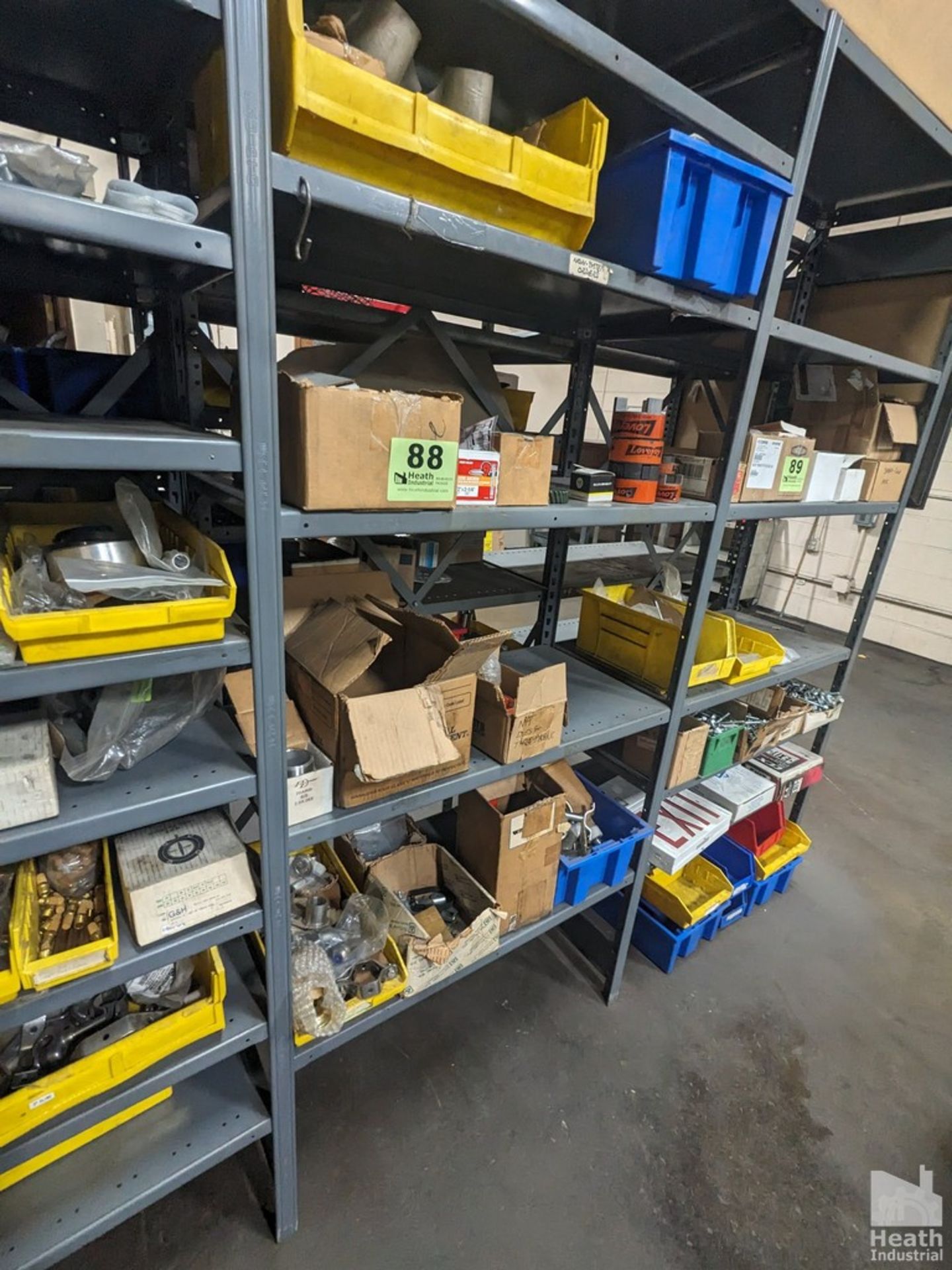 ASSORTED COMPONENTS ON FOUR SHELVES