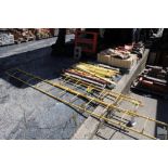 (3) STEEL LADDER SECTIONS AND YELLOW BRACKETS