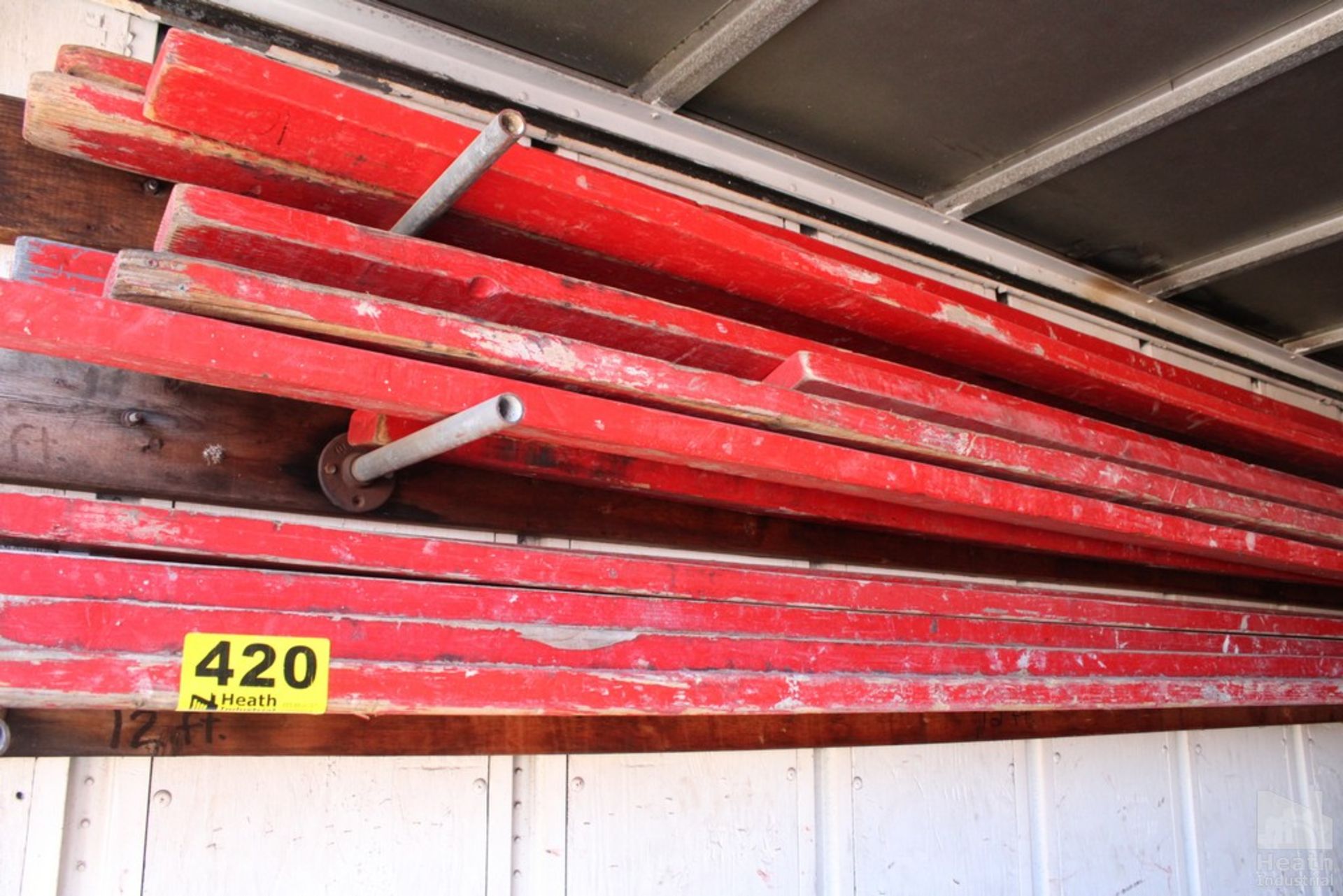 LARGE QUANTITY OF RED 2X4 WOODEN SAFETY RAILS
