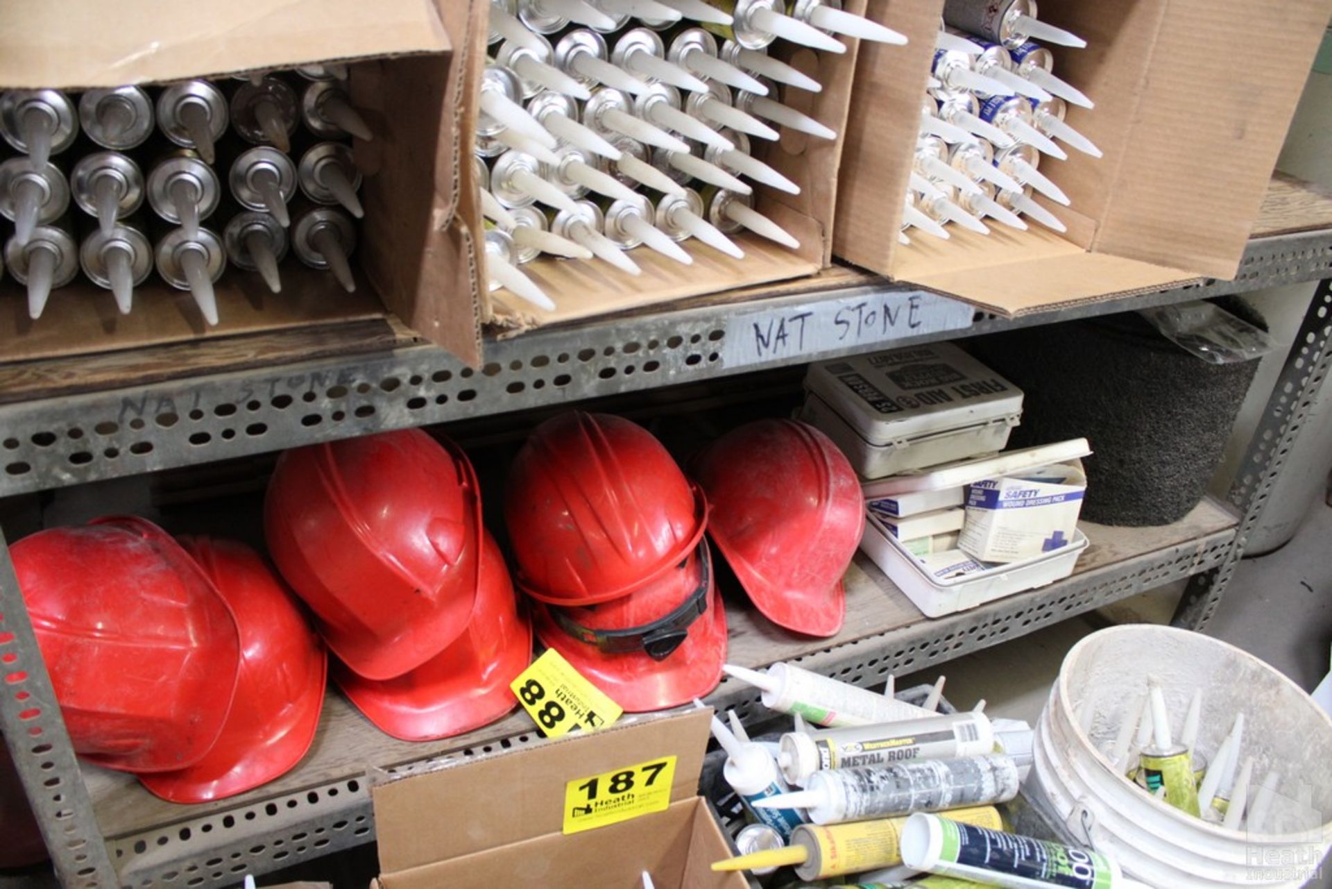 ASSORTED HARD HATS AND MISC. ON SHELF
