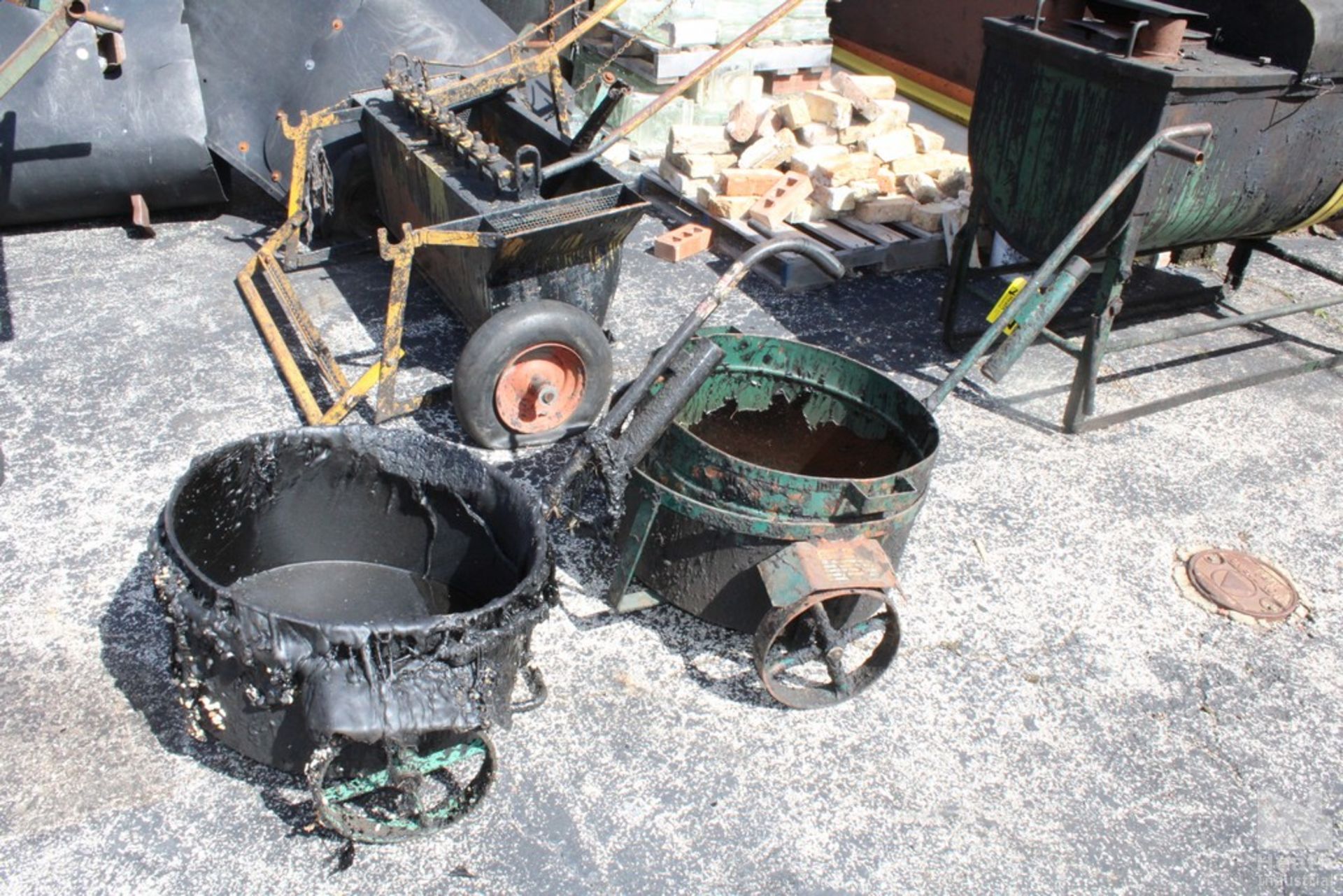 (2) TAR BUCKETS WITH WHEELS AND HANDLES