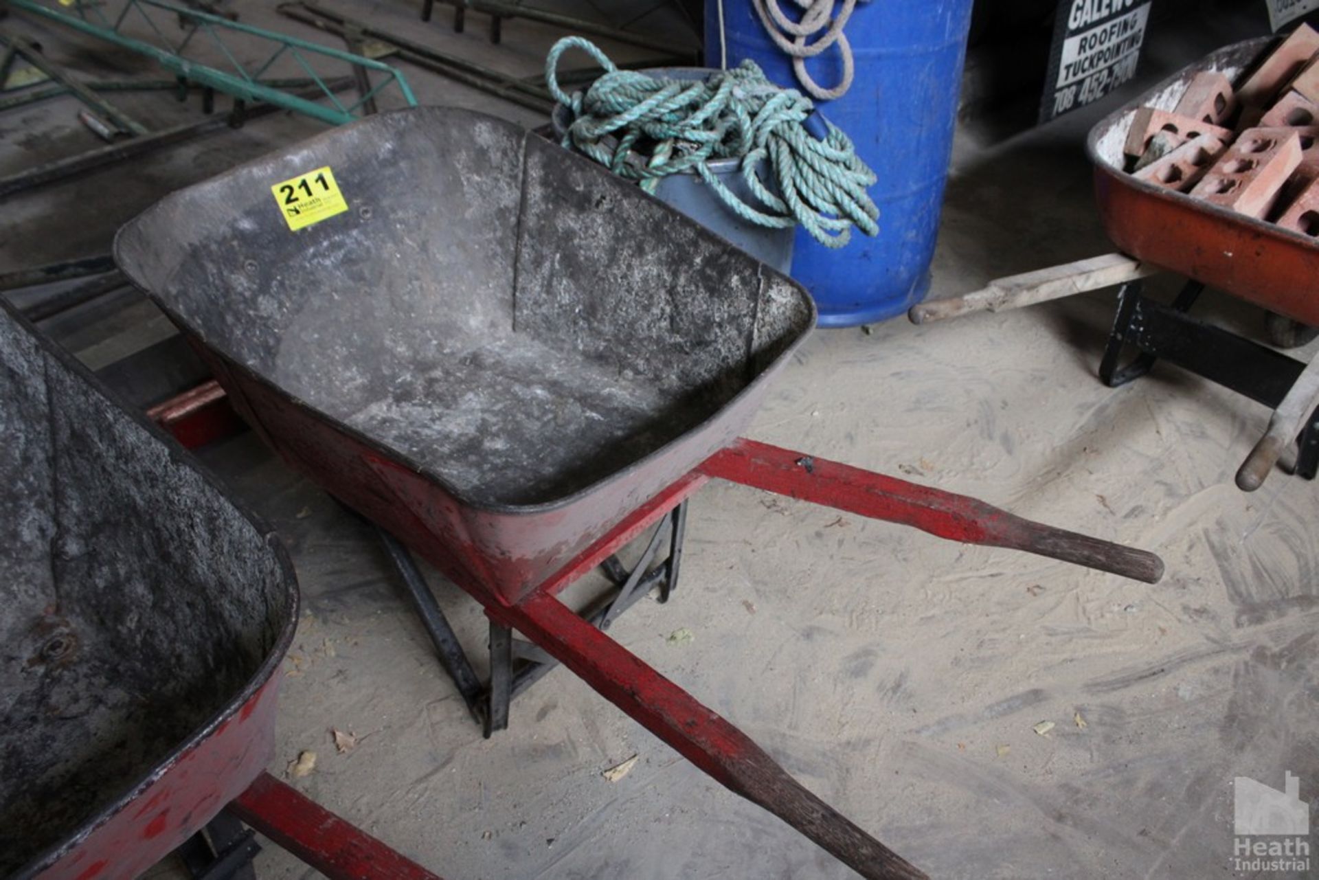 STEEL WHEEL BARROW WITH WOOD HANDLES