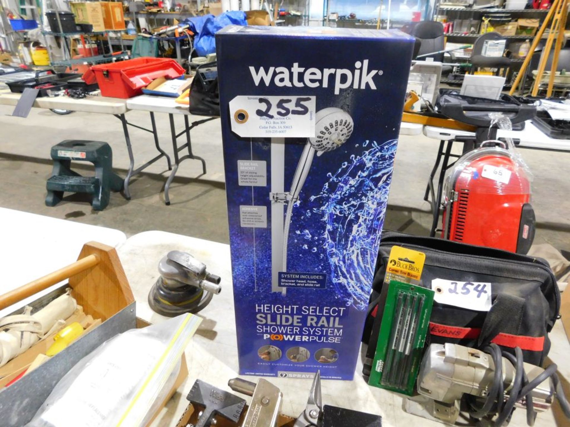WaterPik shower system. (Located at and to be picked up at: 2862 Wagner Rd., Waterloo, IA)