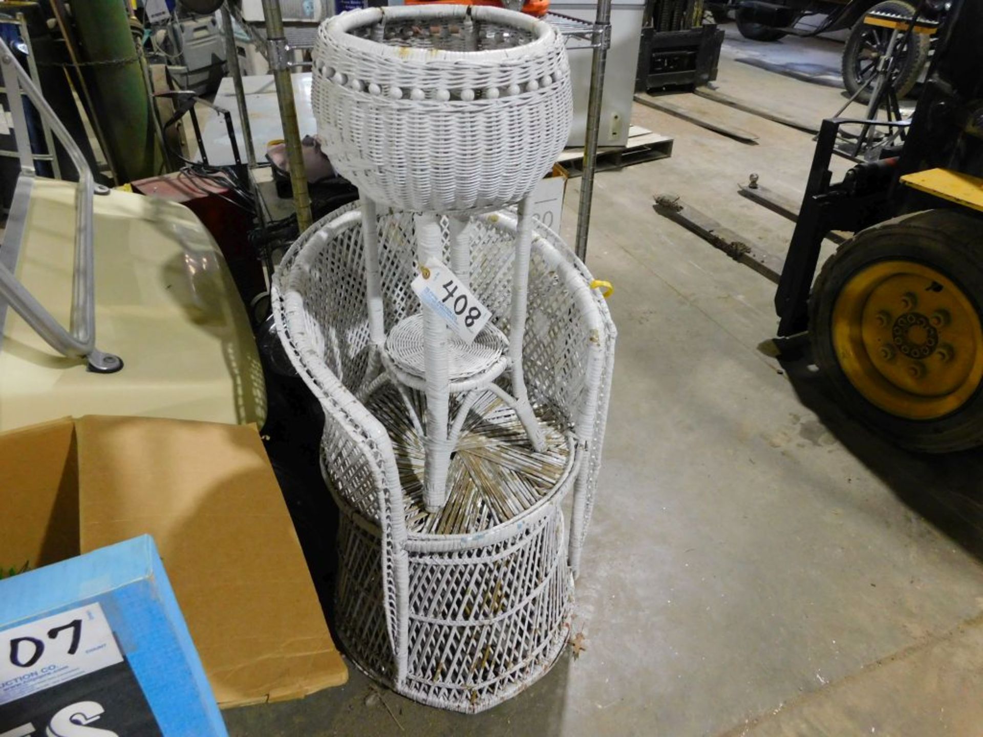Wicker chair, plant stand. (Located at and to be picked up at: 2862 Wagner Rd., Waterloo, IA)