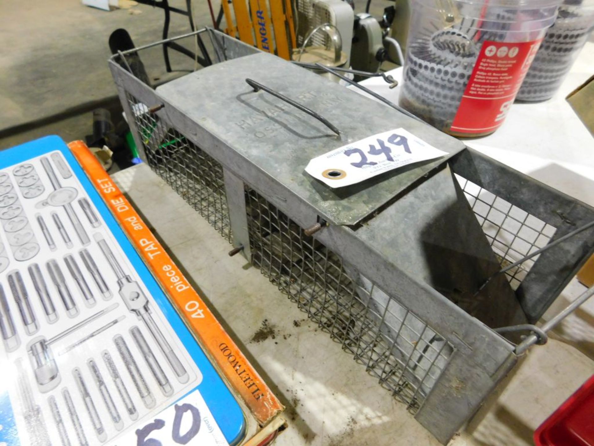Small live trap. (Located at and to be picked up at: 2862 Wagner Rd., Waterloo, IA)