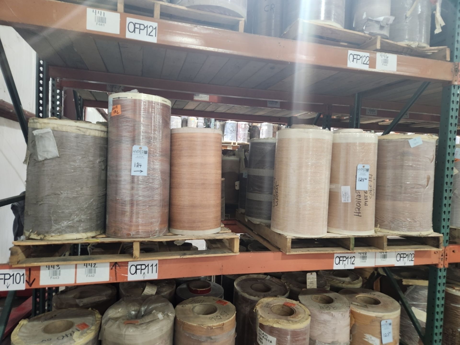 10 Pallets- (98) rolls of finished paper, various colors and sizes. See photos of product listing.