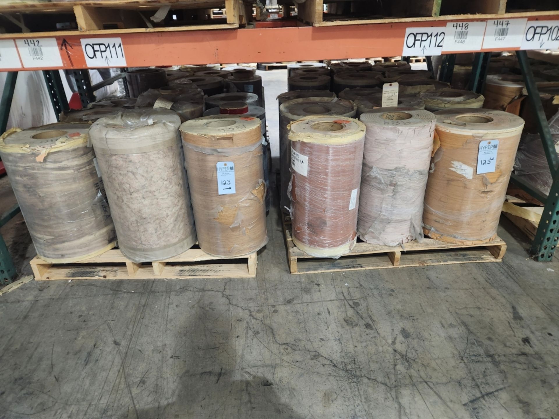 10 Pallets- (88) rolls of finished paper, various colors and sizes. See photos of product listing.