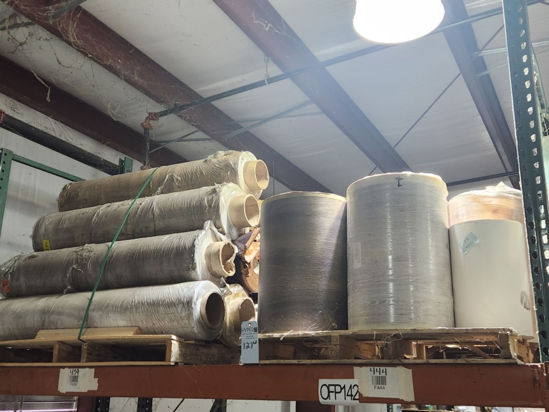 10 Pallets- (122) rolls of finished paper, various colors and sizes. See photos of product listing.